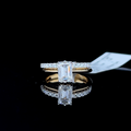 Emerald cut solitaire ring