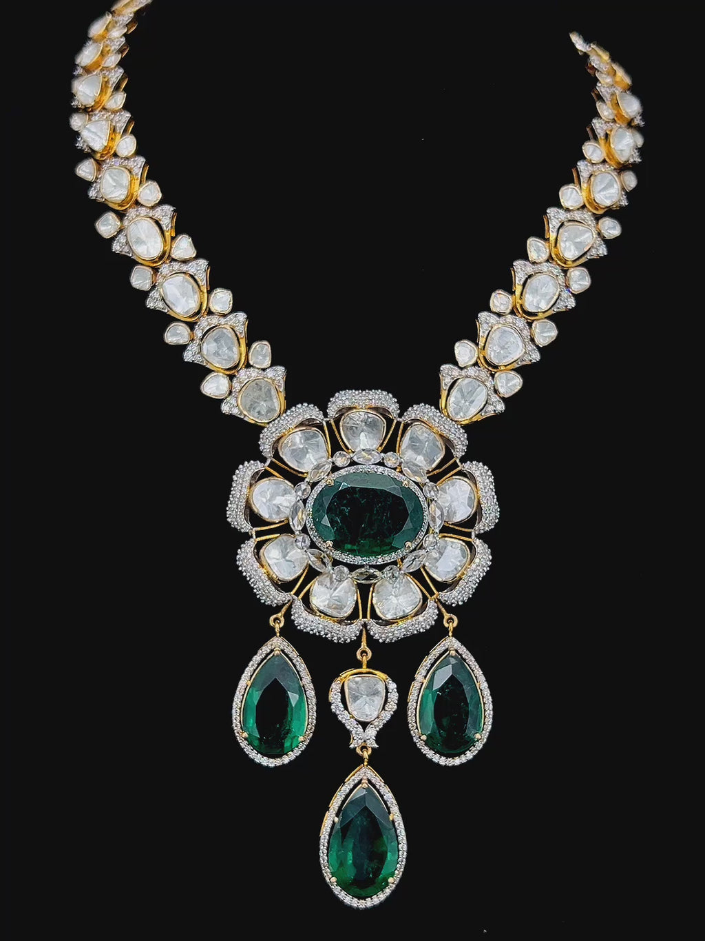 Emerald flower set with rose cut diamonds