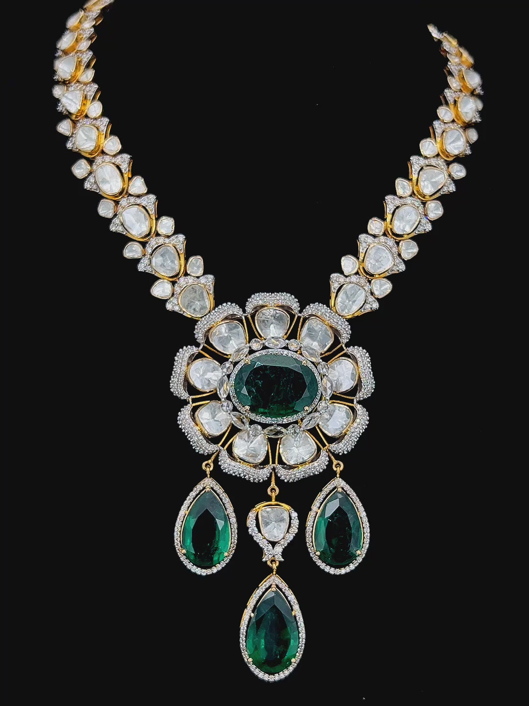 Emerald flower set with rose cut diamonds