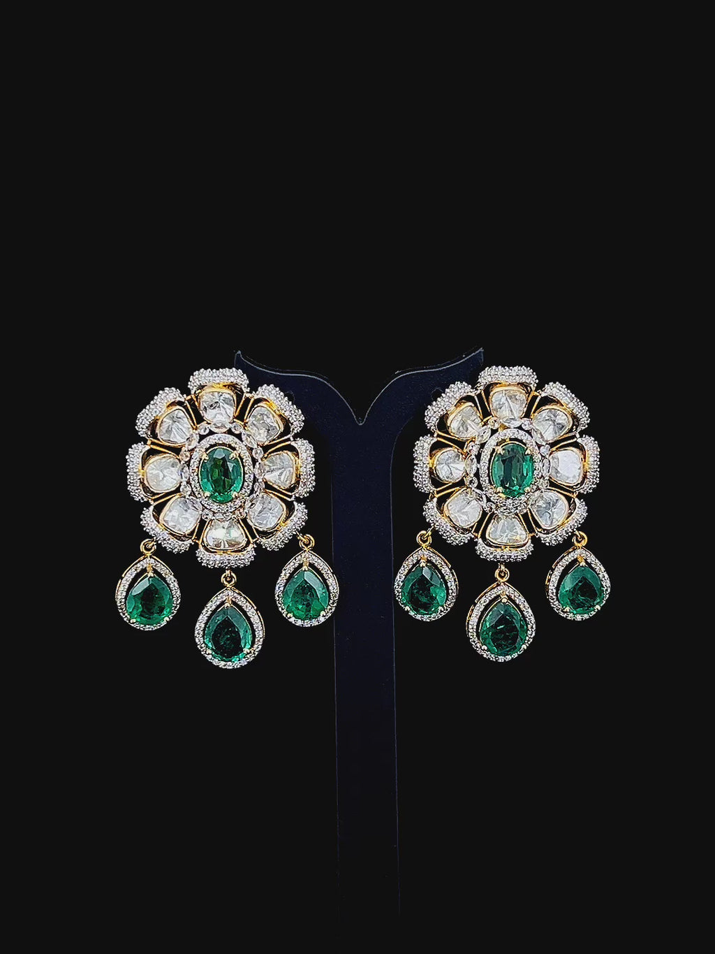 Emerald flower set with rose cut diamonds