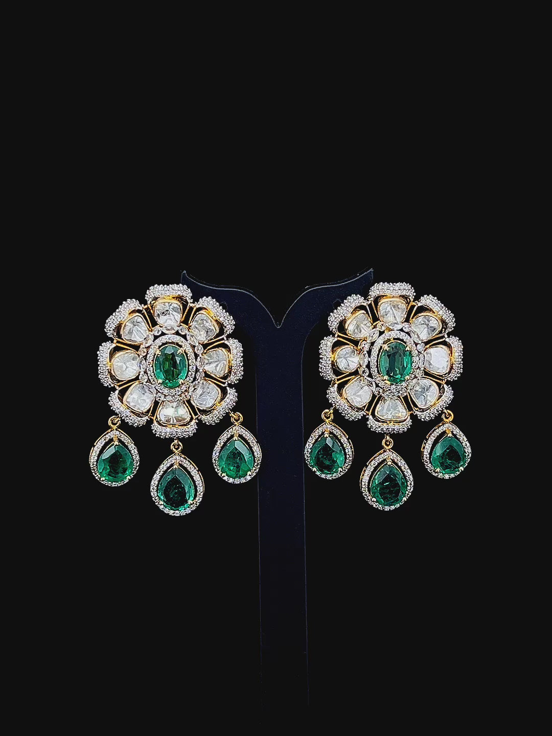 Emerald flower set with rose cut diamonds